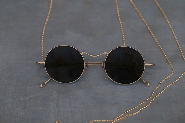 Rigards x UMA WANG joint series round frame glasses RG-RG00UW14-FGJKSHP retro gold frame dark gray lens with chain